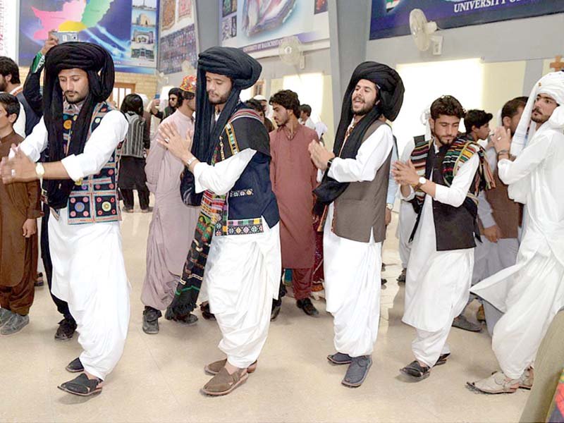students dance on traditional music on baloch culture day in quetta photo app