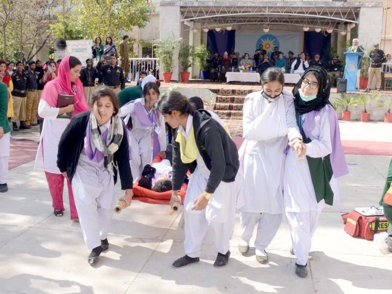girls show rescue skills during an exercise at viqarunnisa post graduate college for women photo agha mehroz express