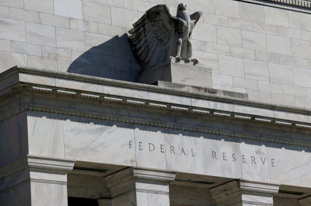 reduces rates by half percentage point to target range of 1 to 1 25 photo reuters reduces rates by half percentage point to target range of 1 to 1 25 photo reuters