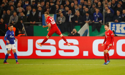 bayern and upstarts saarbrucken reach german cup semis