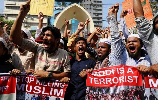 minister terms violence in indian capital very concerning condemns targeting people on basis of religion photo reuters minister terms violence in indian capital very concerning condemns targeting people on basis of religion photo reuters