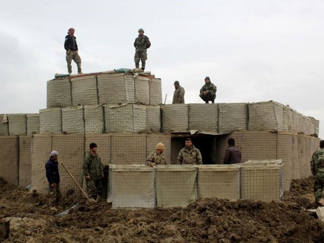 afghan security forces stand guard at an afghan national army ana outpost after an attack by taliban militants in kunduz province on wednesday the us launched an airstrike against taliban fighters to defend afghan forces on march 4 photo afp file afghan security forces stand guard at an afghan national army ana outpost after an attack by taliban militants in kunduz province on wednesday the us launched an airstrike against taliban fighters to defend afghan forces on march 4 photo afp file