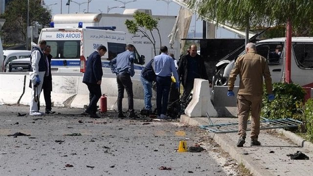 security forces inspect the blast site near the us embassy photo afp file