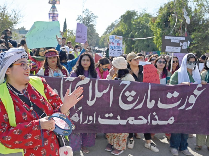 women activists take part in aurat march a demonstration rally to mark international women s day in islamabad photo afp