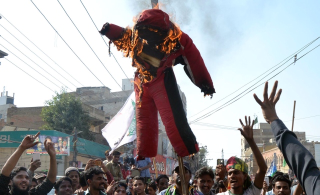 Protesters at Hyderabad's Haider Chowk burned an effigy of former prime minister Nawaz Sharif. PHOTO: ONLINE