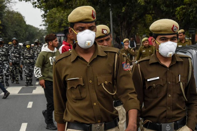 security personnel patrol on a road in new delhi on march 6 2020 photo afp