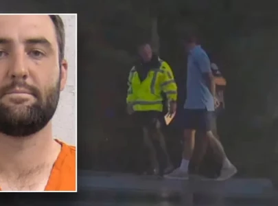 world s ace golfer scottie scheffler arrested jailed and released in time to tee off