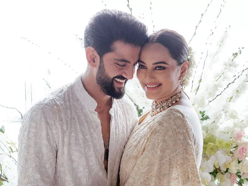 twinning in ivory the couple radiated joy as they commenced their newest chapter photo file twinning in ivory the couple radiated joy as they commenced their newest chapter photo file