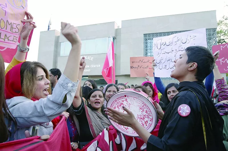 women participate in the aurat march in the federal capital top left amp right a man arrested for wearing a burqa to the aurat march bottom left a woman sports a slogan free woman painted on her cheek bottom right photo agencies women participate in the aurat march in the federal capital top left amp right a man arrested for wearing a burqa to the aurat march bottom left a woman sports a slogan free woman painted on her cheek bottom right photo agencies