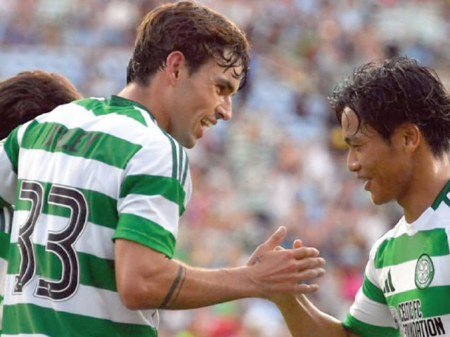celtic players celebrate a goal against manchester city photo afp celtic players celebrate a goal against manchester city photo afp