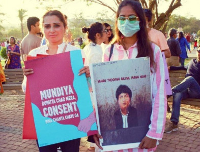 aurat march placards turn up the heat against khalilur rehman