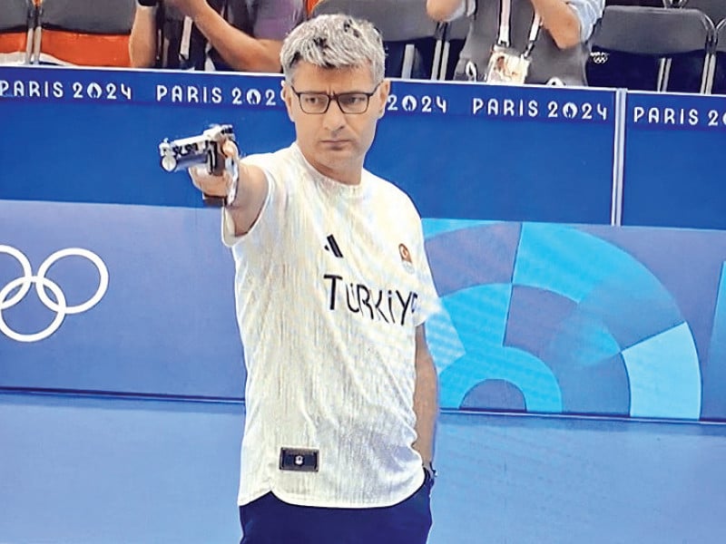 dikec s silver hair intense gaze normal glasses and a jersey that looked like a regular t shirt intrigued netizens photo file
