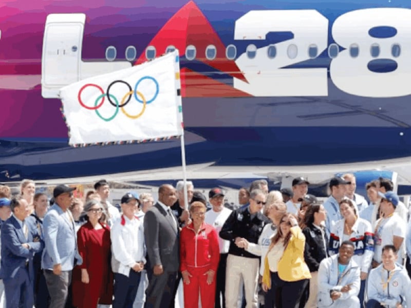 los angeles mayor karen bass held the five ringed olympic banner accompanied by several us athletes photo afp