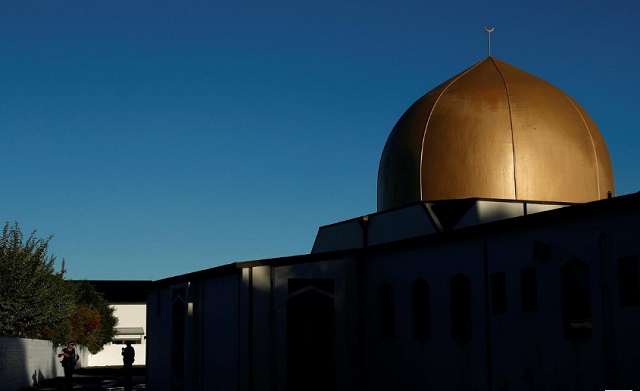 armed police officers stand guard outside al noor mosque where more than 40 people were killed by a suspected white supremacist during friday prayers on march 15 in christchurch new zealand april 1 2019 photo reuters