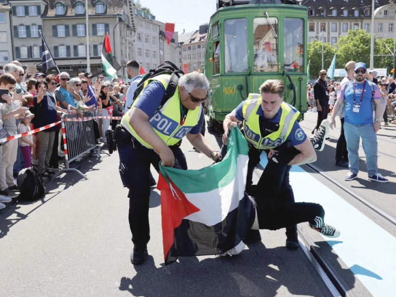 a flag waving protester was tackled by police over a throat slitting gesture photos afp a flag waving protester was tackled by police over a throat slitting gesture photos afp