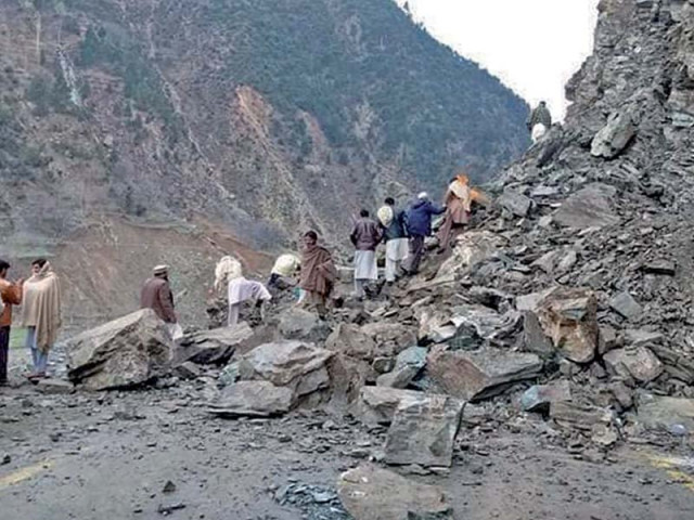 the main road between timergara and upper dir blocked by landsliding due to heavy rains in district photo express the main road between timergara and upper dir blocked by landsliding due to heavy rains in district photo express