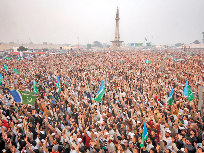 a file photo of ji supporters attending an ijtimah at minar e pakistan photo abid awaz express