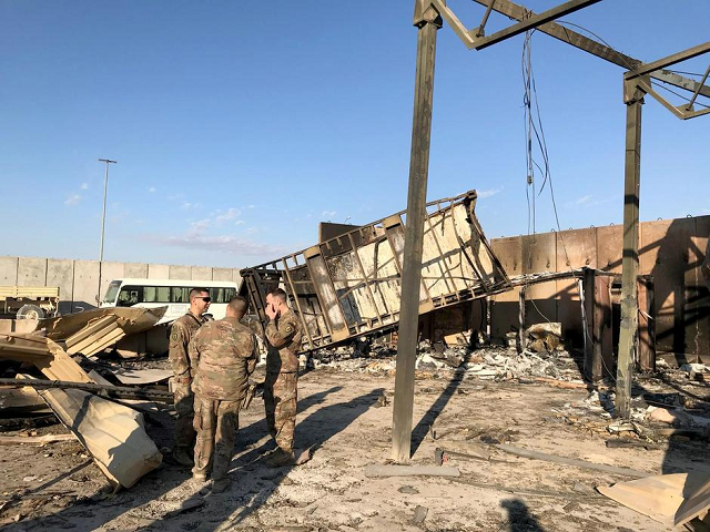 us soldiers are seen at the site where an iranian missile hit at ain al asad air base in anbar province iraq photo reuters us soldiers are seen at the site where an iranian missile hit at ain al asad air base in anbar province iraq photo reuters