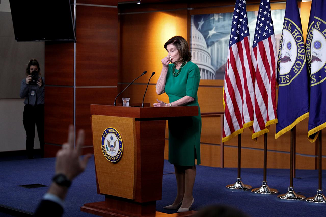 us house speaker nancy pelosi d ca wipes her nose while delivering remarks during a weekly news conference on capitol hill in washington us march 12 2020 photo reuters us house speaker nancy pelosi d ca wipes her nose while delivering remarks during a weekly news conference on capitol hill in washington us march 12 2020 photo reuters