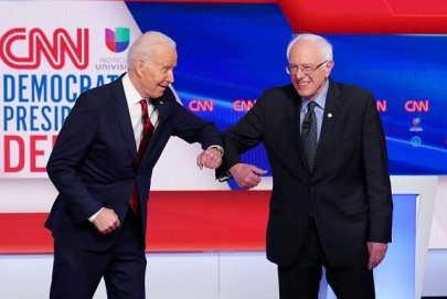 biden sanders attack trump on virus   and spar on record biden sanders attack trump on virus   and spar on record