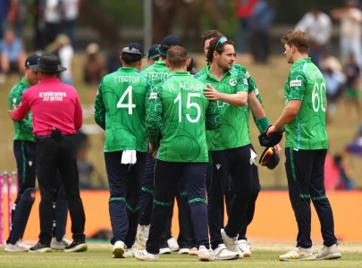tucker stars as ireland crush oman by 96 runs at t20 world cup