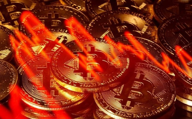 illumination of the stock graph is seen on the representations of virtual currency bitcoin in this picture illustration taken taken march 13 2020 photo reuters illumination of the stock graph is seen on the representations of virtual currency bitcoin in this picture illustration taken taken march 13 2020 photo reuters