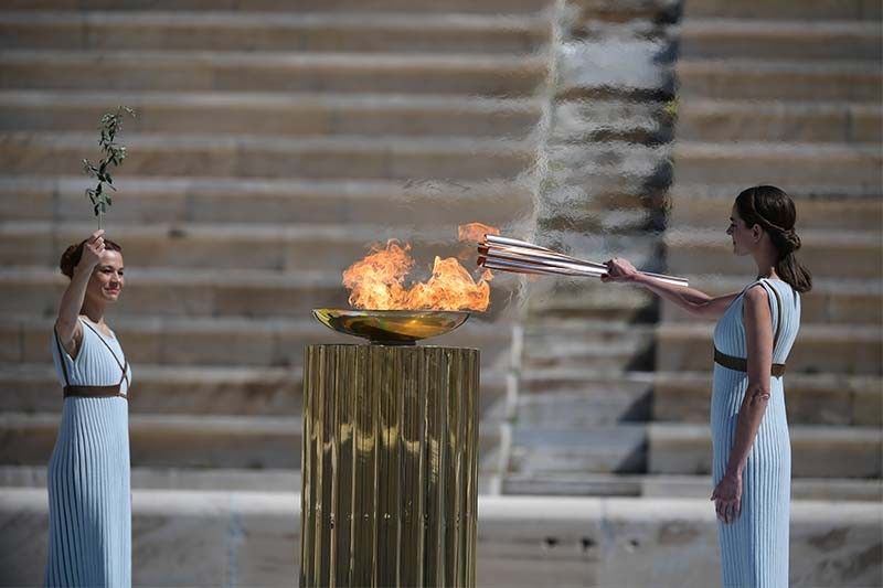 the flame chosen as part of the quot recovery olympics quot to showcase the region 039 s revival after the 2011 natural disasters photo afp