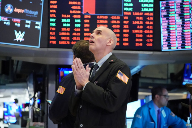 investors take solace in blockbuster series of measures aimed at cushioning economic blow from coronavirus photo afp investors take solace in blockbuster series of measures aimed at cushioning economic blow from coronavirus photo afp