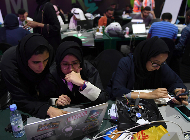 Participants including Saudi women attend a hackathon in Jeddah on August 1, 2018, prior to the start of the annual Hajj pilgrimage in the holy city of Mecca. PHOTO:AFP