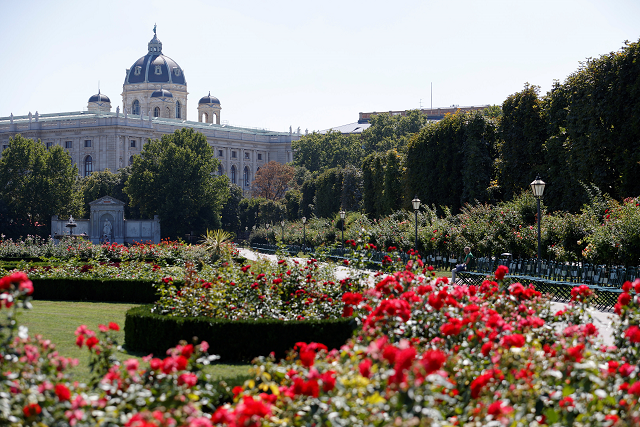  A woman rests in a public garden next to the Natural History Museum in Vienna, Austria. PHOTO:REUTERS