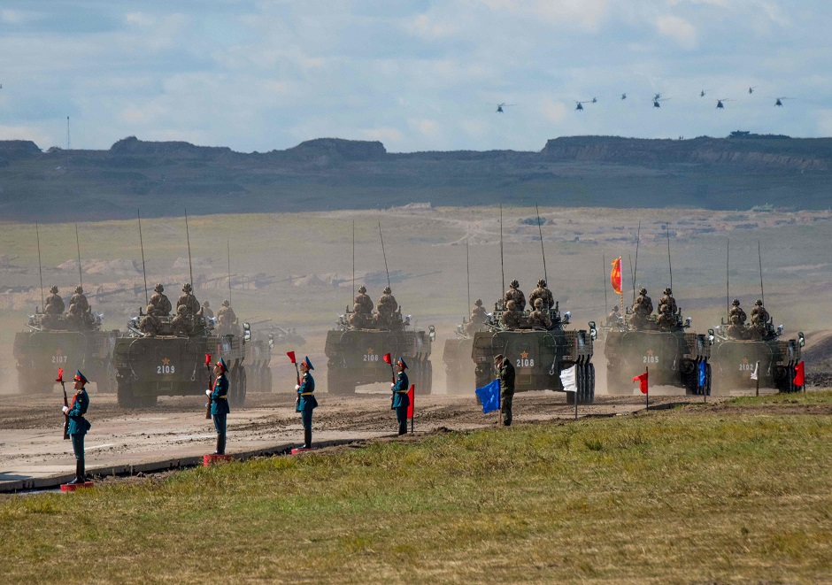 Russian, Chinese and Mongolian troops and military equipment parade at the end of the day of the Vostok-2018 PHOTO: AFP