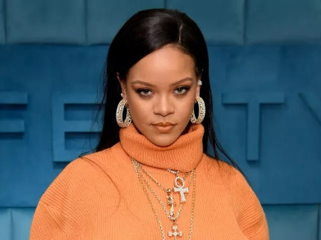 rihanna spotted at camp flog gnaw 2025 in los angeles sipping from a stainless steel champagne flute