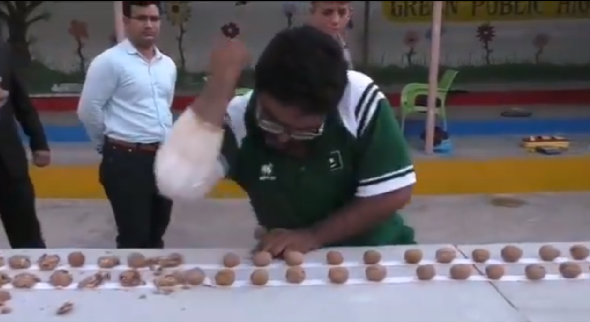 pakistani martial artist breaks india s world record by crushing 256 walnuts with elbow
