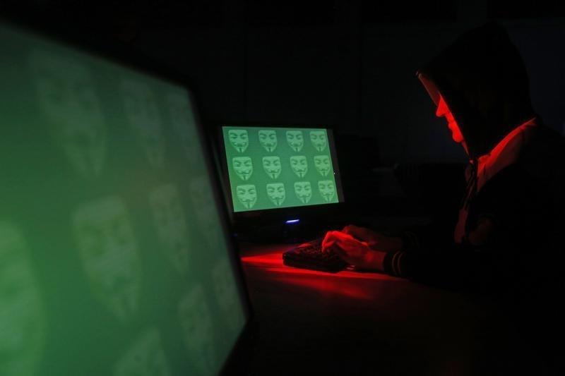 man poses in front of on a display showing the word 039 cyber 039 in binary code in this picture illustration taken in zenica photo reuters