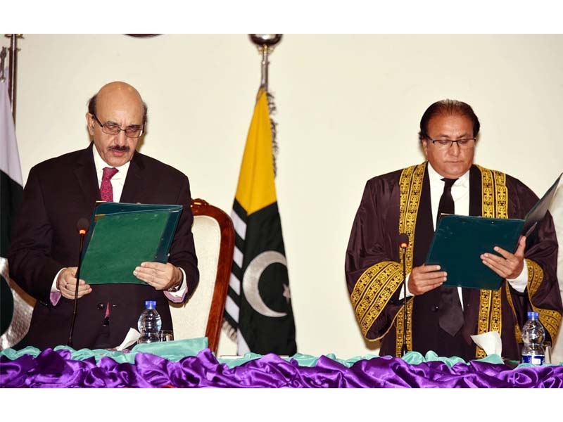 president sardar masood khan administers the oath in a limited ceremony in the walk of coronavirus outbreak photo express