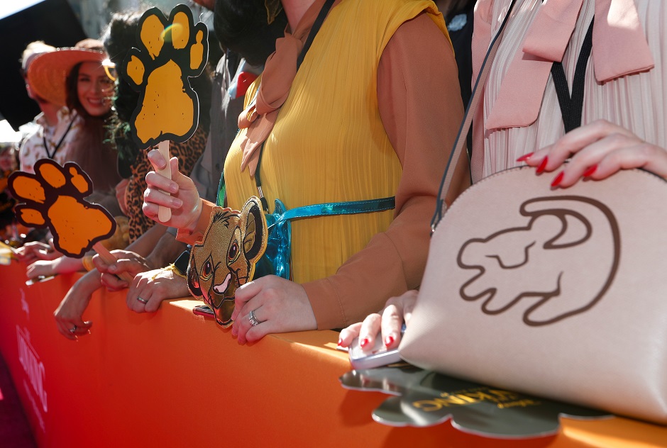 People wait for the arrivals of cast members at the World Premiere of 