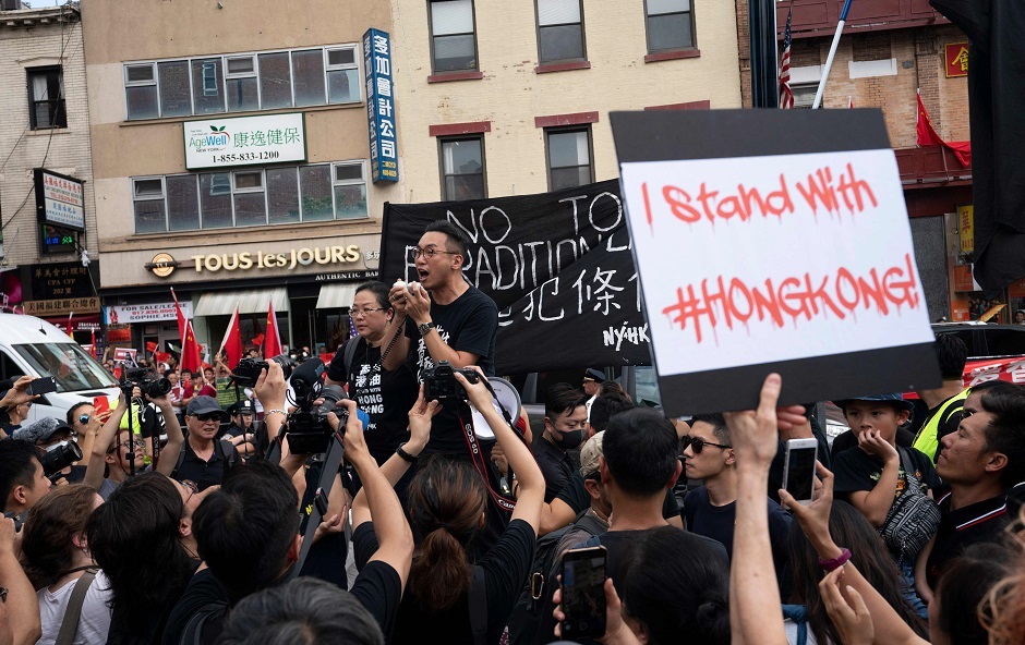 Hong Kong Civic Party leader Alvin Yeung delivers a speech in Confucius Plaza  in New York. PHOTO: AFP 