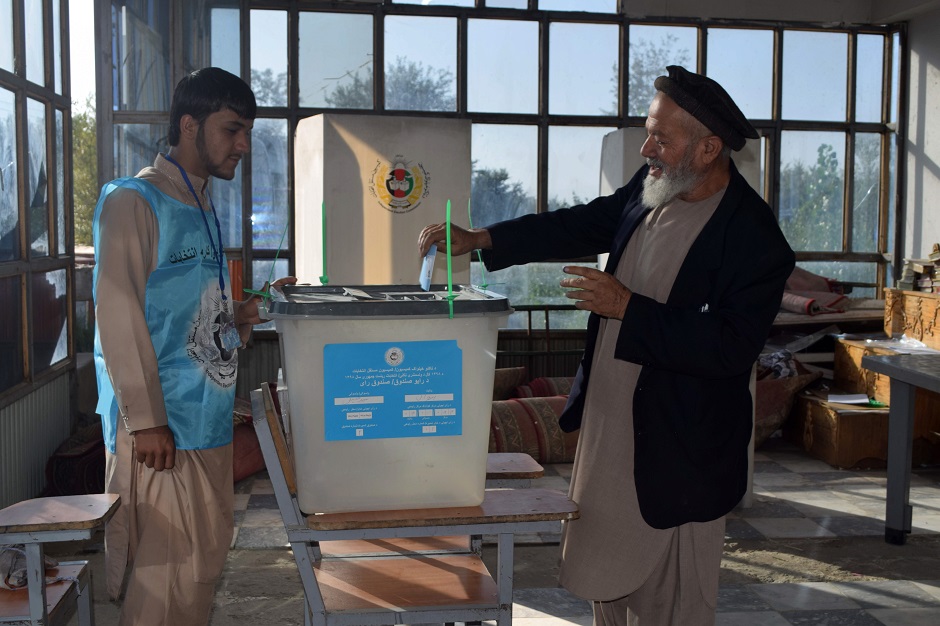 An Afghan man casts his ballot at a polling station in Parwan. PHOTO: AFP