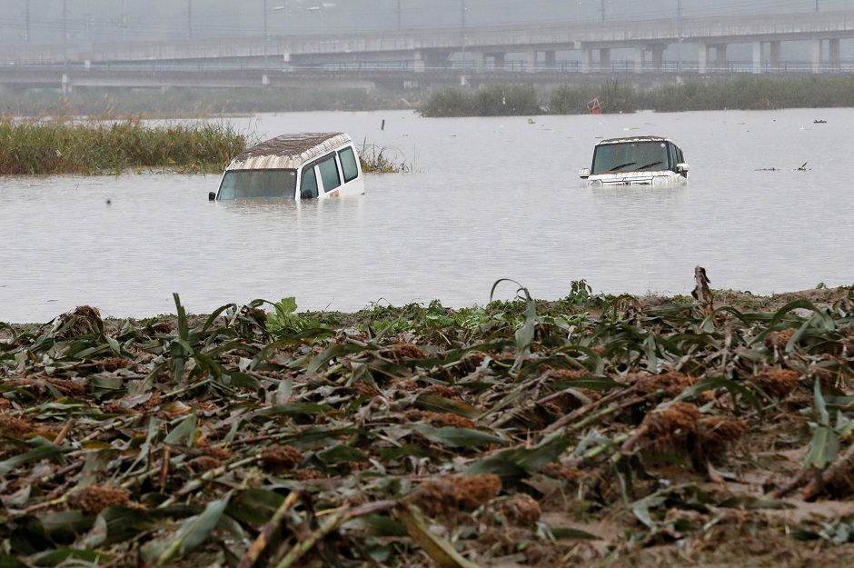 Cars are seen in the aftermath of Typhoon Hagibis. PHOTO: REUTERS