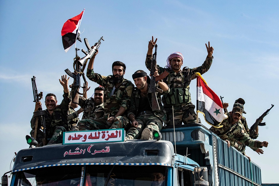 Syrian government forces arrive in the town of Tal Tamr. PHOTO: AFP