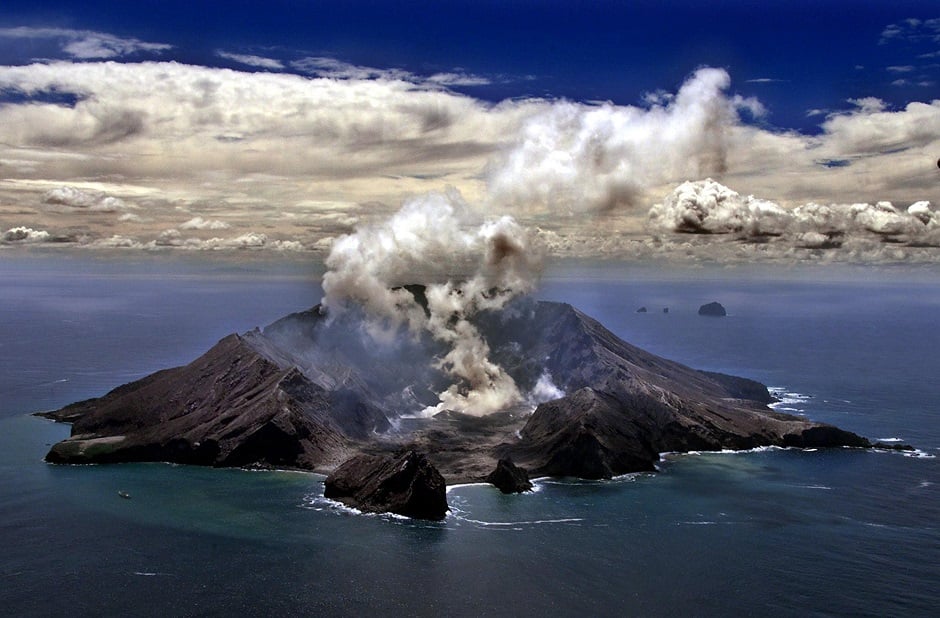  New Zealand's most active volcano on White Island in the Bay of Plenty giving off dense plumes of steam and gas. PHOTO: AFP