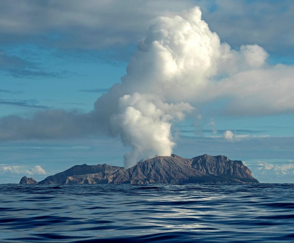 The picture shows the volcano on New Zealand's White Island spewing steam and ash. - About 100 tourists were 