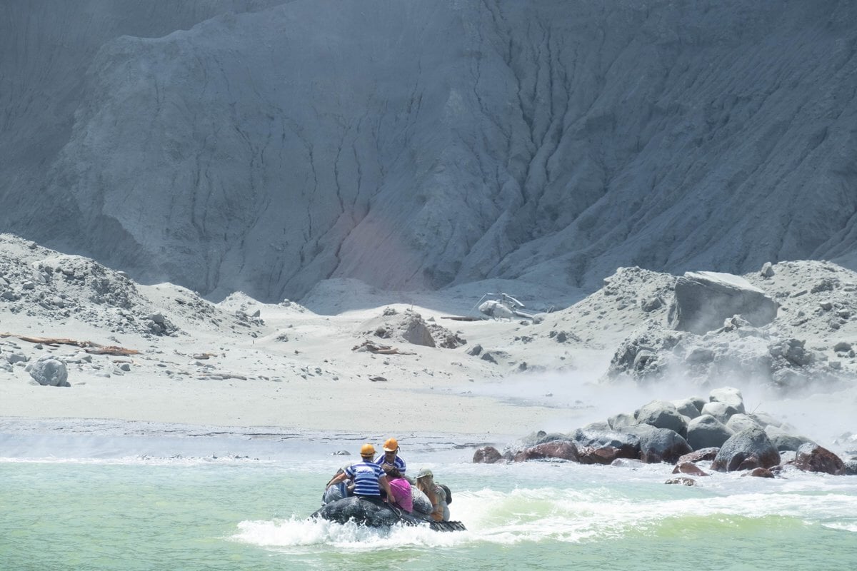 White Island Tour operators rescuing people minutes after the volcano on New Zealand's White Island erupted. PHOTO: AFP 