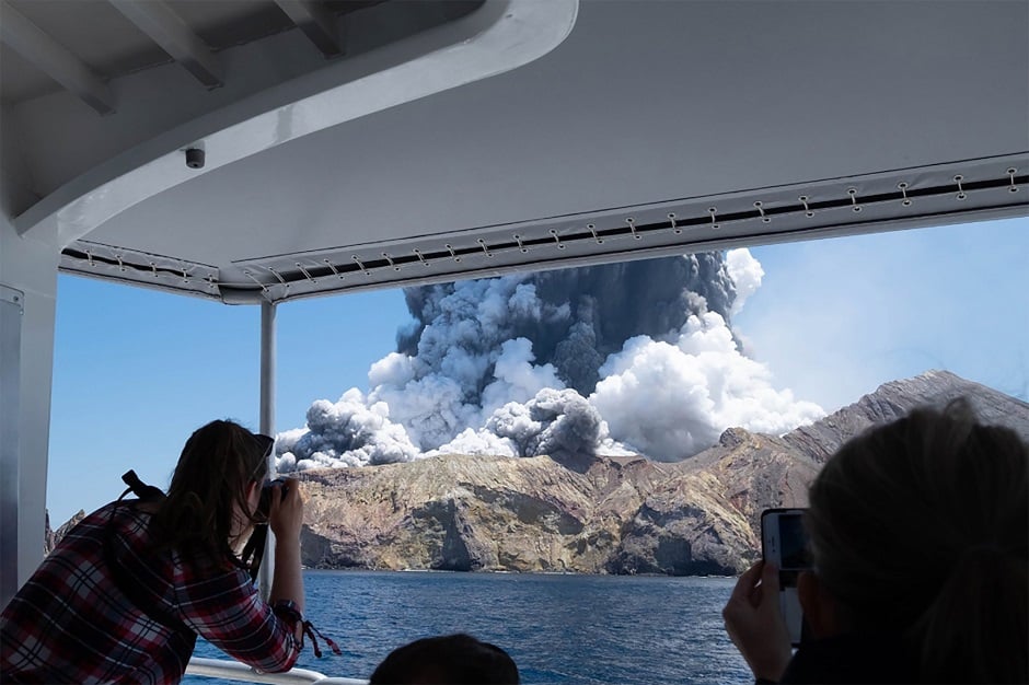 New Zealand police said at least one person was killed and more fatalities were likely, after an island volcano popular with tourists erupted. PHOTO: AFP 