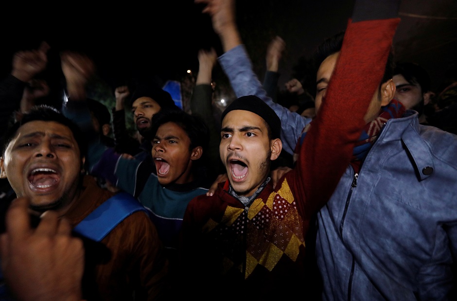  Demonstrators shout slogans during a protest against a new citizenship law, outside the police headquarters in New Delhi. PHOTO: REUTERS 