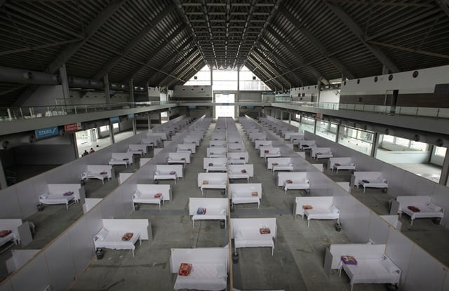 a general view of beds set up at the premises of the expo center after the government turned it into a hospital following the outbreak of coronavirus disease covid 19 in lahore reuters a general view of beds set up at the premises of the expo center after the government turned it into a hospital following the outbreak of coronavirus disease covid 19 in lahore reuters