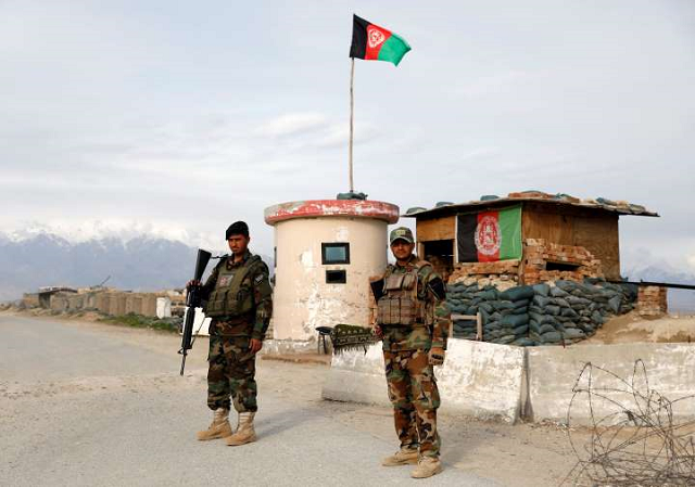 afghan national army ana soldiers stand guard at a checkpoint outside bagram prison north of kabul afghanistan april 8 2020 photo reuters afghan national army ana soldiers stand guard at a checkpoint outside bagram prison north of kabul afghanistan april 8 2020 photo reuters