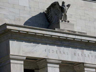 us fed policymakers working to limit damage to economy
