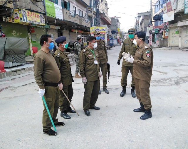 a large contingent of police rangers and pakistan army assist local administration in maintaining lockdown photo express