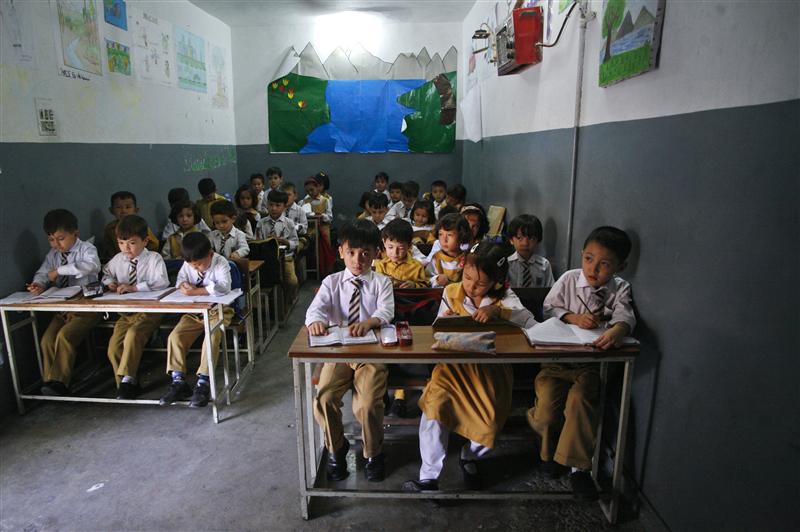 hazara students attend a class at ummat public school in mehrabad quetta august 31 2012 photo reuters